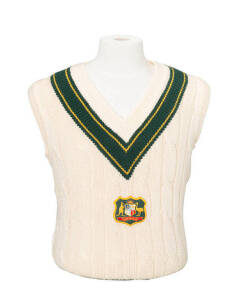 RAY BRIGHT'S AUSTRALIAN TEST JUMPER (sleeveless), with Australian Coat-of-Arms badge on front. Fine condition. [Ray Bright played 25 Tests 1977-87].