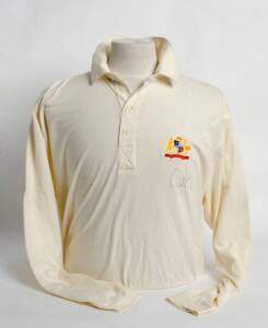 AUSTRALIAN TEST SHIRTS, one with embroidered Coat-of-Arms signed by Damien Fleming; other c1993 with ACB & XXXX logos, player unknown (a few spots).