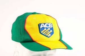 MATT NICHOLSON'S AUSTRALIA A ONE-DAY CAP, yellow & green with embroidered "ACB" logo on front, and "AUSTRALIA/ A" on reverse, signed inside by Matt Nicholson. Fine condition. [Matthew Nicholson played 1 Test 1998 and over 100 first-class games for NSW, We