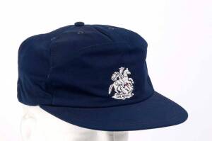 JACK RUSSELL'S ENGLAND TOURING TEST CAP, baseball-style, navy blue, embroidered St.George & Dragon on front, signed inside & dated "95". VG condition. [Jack Russell played 54 Tests 1988-98].