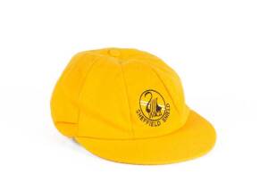 TOM MOODY'S WESTERN AUSTRALIA CAP, yellow with embroidered "WACA/ Sheffield Shield" logo on front, signed inside by Tom Moody. G/VG condition. [Tom Moody played 8 Tests & 76 ODIs 1987-2000].