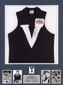 JIM STYNES" VICTORIAN FOOTBALL JUMPER, match worn in 1991 Tasmania v Victoria match, and swapped with Tasmania's David Grant after the match, window mounted, framed & glazed, overall 83x107cm. 