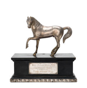 1951 DELHI MEETING - CHANOD TROPHY, fine metal model of a horse, Anglo-Indian, with silver plaque engraved, "Delhi Autumn Meeting 1951. The Chanod Trophy, presented by Kumar Chiman Singh", ebonised plinth, 30cm high.