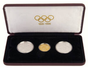 AUSTRIA: 1896-1996 Olympic Centennial Coin Program. 1995 cased proof set of 3. 1000 schilling GOLD Zeus (AGW. 0.5003) plus 200 schilling Gymnast and Slalom Skier. With the 3 certificates.