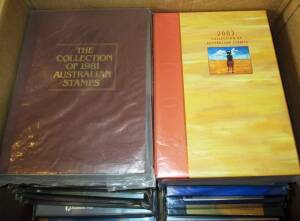 AUST. POST YEAR ALBUMS: 1981-2003. First few years albums effected by moisture, stamps OK. Later years many appear to be un-opened by vendor. FV $850+.
