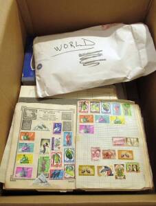 Two large boxes with a 'whole' world collection in older style albums, stockbooks and on pages. Majority used, many 1,000's.