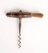 A turned hardwood corkscrew with bottle brush, French, 19th Century. 11.5cm long.