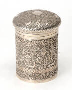 An Anglo-Indian silver canister and cover, mid 19th Century. 15cm high, 11.5cm diameter.