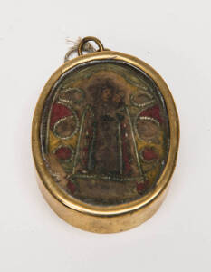A reliquary in brass frame, Spanish, 18th Century, 7 x 5.5 cm