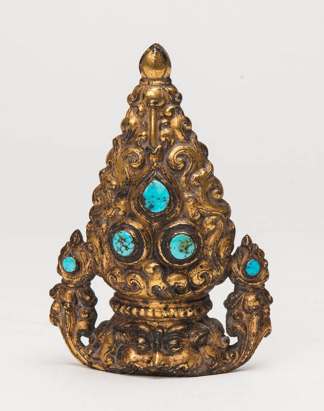 A Tibetan gilt-bronze crown finial, set with turquoises, circa 16th Century, 13cm