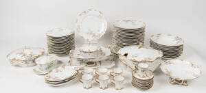 LIMOGES French porcelain dinner service (part set); Tureens (3), comports (2), serving & side dishes (6), coffee cups (7), saucers (11), entree plates (17), dinner plates (21), bowls (10). Early 20th century