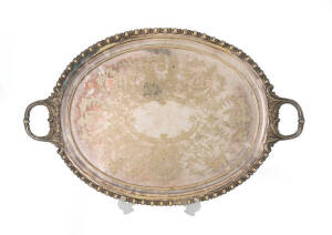 A large silver-plated engraved oval tea-tray, 19th century. 