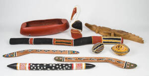 Collection of Aboriginal tribal artefacts, late 20th century, comprising pair of boomerangs, digeridoo, painted bird, digging stick, carved crocodile, coolamon, painted emu egg & boab nut. 9 items. 