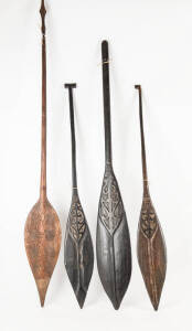 PADDLES: Carved wood, Papua New Guinea origin, 20th century. 120cm to 180cm.