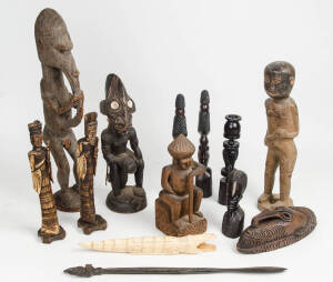 TRIBAL ARTIFACTS: Group comprising Cook Islands seated figure; carved timber statues & masks from Papua New Guinea & Africa; carved hippopotamus tooth; pair carved bone figures; lime spatula. Mixed condition & age. (14 items)