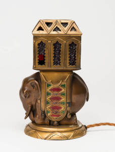 A brass and coloured glass elephant form table lamp, continental, 20th Century. 24cm high.