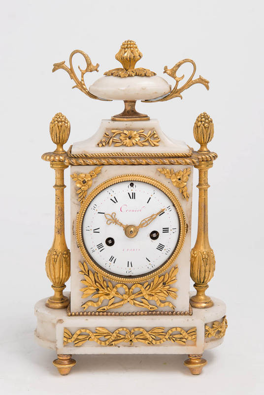 A Louis XVI gilt bronze and Carrara marble mantle clock, French, 18th  century. Signed Cronier, Paris.