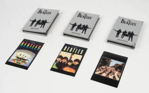 THE BEATLES: "The Beatles Silver Coin Series Commemorative Coin Set" complete set of 12 one ounce silver "coins" issued by the Chicagoland Processing Corporation. All cased in grey suede-covered presentation folders with matching logos and illustrated boo