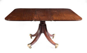 Georgian mahogany pedestal base extension dining table, circa 1800. Height 72cm, width 139cm, depth 122cm.