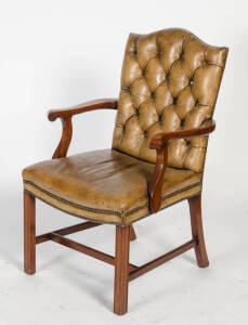 Button back leather carver chair in the Georgian style, 20th century.