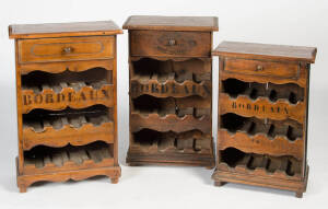 Three wine display storage cabinets, Baltic pine, late 20th century. Largest 85cm high, 58cm wide, 29cm deep.