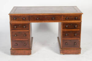 Early Victorian twin pedestal desk with embossed leather top. Height 73cm, width 122cm, depth 67cm.