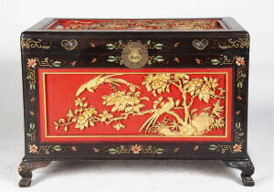 Chinese carved camphorwood trunk with painted & gilt finish. Height 70cm, width 101cm, depth 53cm