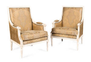 A pair of French style white painted arm chairs with gold brocade upholstery & assorted fabrics.