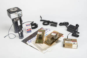 METZ APPARATEFABRIK (Germany): A Metz 60 CT-4 flash head and handle together with a large group of Metz accessories - SCA adaptors, brackets, manuals, filters, cables, charger etc. The accessories appearing to be unused.