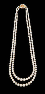 A double strand cultured pearl necklace with citrine clasp