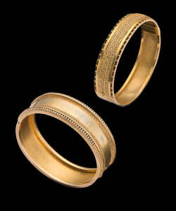 Two cuff bangles, Victorian, 15ct and 18ct yellow gold.