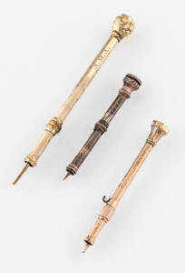 Three propelling pencils, stone set.