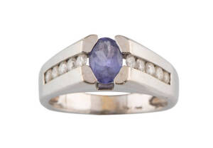 A diamond and tanzanite ring, 14ct white gold.