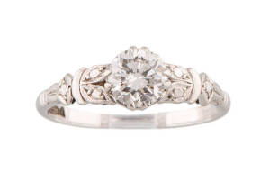 A solitaire diamond ring, known weight of diamond 0.64ct, 18ct white gold and platinum.