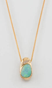 An opal and diamond pendant, yellow gold, weight 10.9 grams.