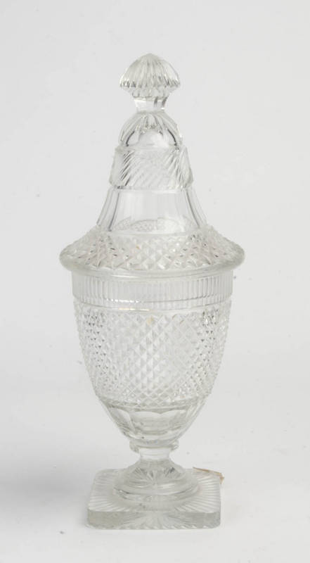 A Georgian cut crystal lidded vase, early 19th Century (damaged)