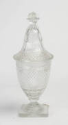 A Georgian cut crystal lidded vase, early 19th Century (damaged)