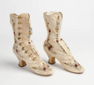 A pair of French antique embroidered button up ladies boots.