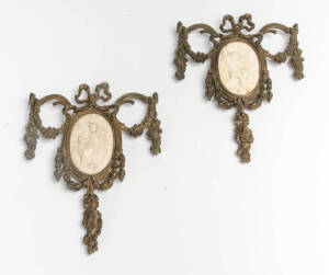 Pair of French compostion & metal decorative wall plaques inlaid with classical reliefs. Height 21cm, width 16cm.