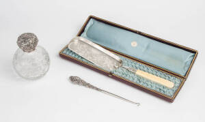 Sterling silver topped crystal vanity bottle, sterling silver boot hook & and ivory and silver plated crumb tray in presentation box by R. Gourlay of Melbourne (3 items).