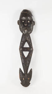 FOOD HOOK: Papua New Guinea carved wood and shell, mid 20th century. 110cm.