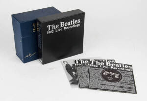 THE BEATLES: "The Beatles Singles Collection" BSCP1 complete in blue presentation box [1982]; also, "The Beatles 1962 Live Recordings" TABOKS1001 [1988] complete in black presentation box.