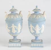 Wedgwood pair of blue jasper ware urns, English, 19th Century. 20cm high.