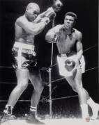 MUHAMMAD ALI, signed photograph from the Muhammad Ali vs Doug Jones fight, March 13th 1963, size 40x51cm. With 'Online Authentics' No.OA-8090290.