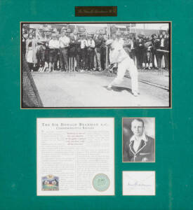 DON BRADMAN, display "Sir Donald Bradman A.C.", with signature on piece, window mounted with two photographs, limited edition 496/2500, framed & glazed, overall 53x56cm. With CoA.