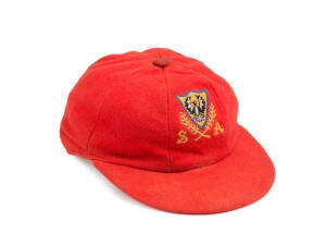 RODNEY HOGG'S SOUTH AUSTRALIA CAP, red wool with embroidered SA logo on front. Fair/Good match-worn condition. Ex John Maclean collection. [Rodney Hogg played 38 Tests & 71 ODIs 1978-85].