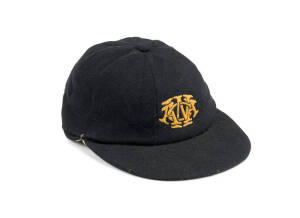 WESTERN AUSTRALIA CAP, black wool with embroidered WACA monogram on front. Good match-worn condition, player unknown. Ex John Maclean collection.