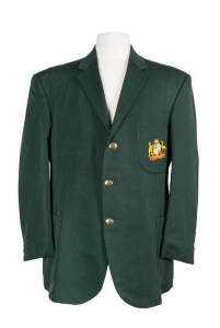 JOHN MACLEAN'S AUSTRALIAN BLAZER, dark green with embroidered Australian Coat-of-Arms on pocket. Good condition.