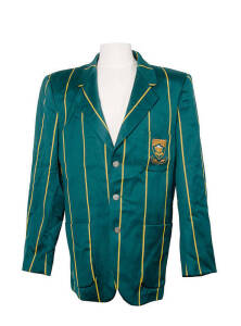 SOUTH AFRICAN TEST BLAZER, green with yellow stripes, polyester/viscose, embroidered wire Protea & "S.A. Cricket" on pocket, ownership unknown. Good condition (couple tiny holes in sleeves).