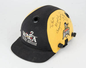 JUSTIN LANGER'S WESTERN AUSTRALIA CRICKET HELMET, black & yellow, with "WACA/ Western Australia/ Cricket Association" logo on front, signed & endorsed on side by Justin Langer, and dated 15.11.08. Fair/Good match-used condition. [Justin Langer played 105 